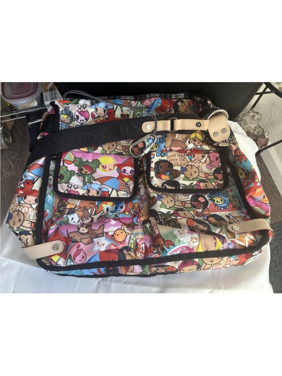 Lesportsac Handbags - LeSportsac Multicolor Character Print Tote with Black Trim